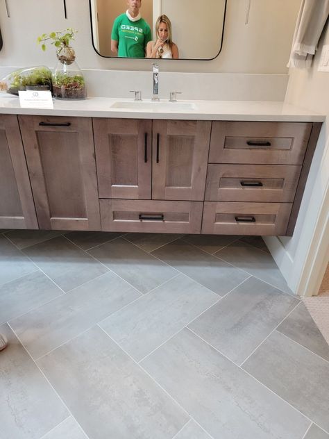 Wood Vanity Grey Floor, Master Bath Grey Floor, Bathroom Stained Cabinets Master Bath, Grey Wood Bathroom Vanity, Bathroom Tile With Dark Cabinets, Bathroom Vanity Stained Wood, Master Bath New Construction, Wood Vanity Gray Floor, Light Grey Bathroom Floor Tile