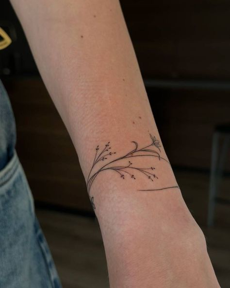 Delicate Flower Wrist Tattoo, Fine Line Ankle Bracelet Tattoo, Fine Line Tattoo Arm Women, Fine Line Tattoo Bracelet, Wrist Fine Line Tattoo, Flower Wrist Wrap Tattoo, Fine Line Tattoo Wrist, Flower Cuff Tattoo, Flower Arm Band Tattoo