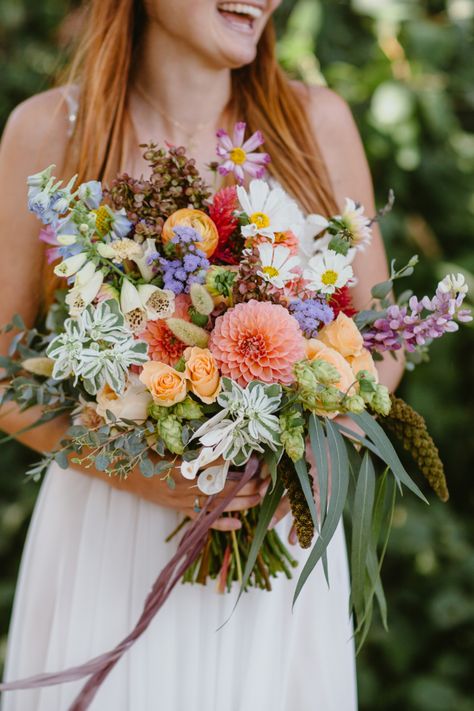 Summer wildflower bouquet made with all local blooms, like dahlias, cosmos, foxglove, and lupine. Fake Wildflower Wedding Bouquet, English Wildflower Bouquet, Summer Dahlia Bouquet, Summer Garden Bouquet, Daisy Wildflower Bouquet, Meadow Bouquet Wedding, Boho Wedding Bouquet Wildflowers Rustic, Dahlia Wildflower Bouquet, Forest Wedding Colors Palette Summer