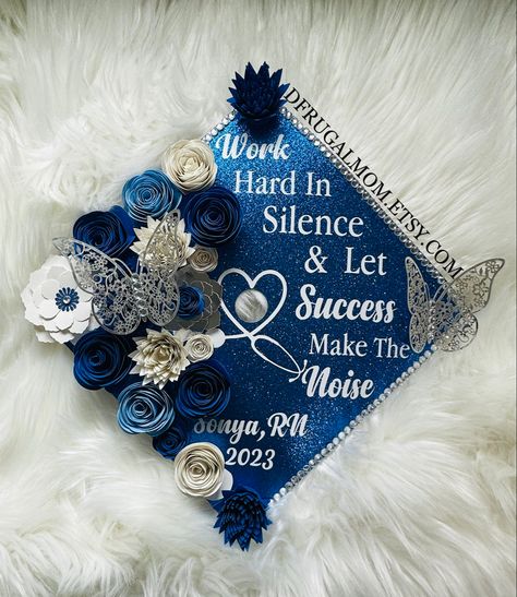 Cap Decoration Graduation Blue, Blue Grad Cap Ideas, Graduation Cap Designs First Generation, Graduation Cap Designs Navy Blue, Pretty Educated And Graduated Cap, Graduation Cap Decoration Remembrance, Graduation Cap Decor, Graduation Cap Decoration Nursing, Flower Graduation