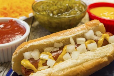 Condiments and toppings help make the perfect roasted wiener. Wiener Roast Party Ideas, Weiner Roast Food Ideas, Weenie Roast Party Ideas, Wiener Roast Food Ideas, Weiner Roast Side Dishes, Weiner Roast Party Ideas, Brick Chili Recipe, How To Serve Hotdogs At A Party, Superbowl Chili Recipe