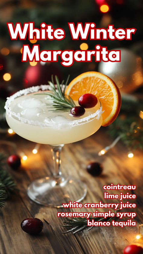 White Winter Margarita Recipe White Christmas Margaritas For A Crowd, Winter White Sangria Recipe For A Crowd, Winter White Margarita, Rosemary Cranberry Margarita, Christmas Margaritas Recipes, White Winter Cocktails, Snowball Margarita, White Margarita Christmas, Christmas Cocktails Recipes Tequila