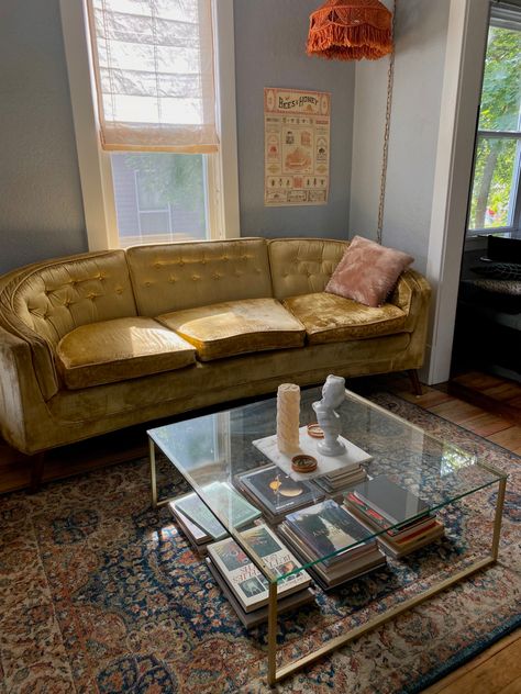 Coffee Table Gold Glass, Yellow Aesthetic Living Room Decor, Vintage Yellow Couch Living Room, Modern Velvet Couch, Golden Couch Living Rooms, Yellow Velvet Couch Living Room, Mustard Rug Living Room, Velvet Couch Aesthetic, Yellow Couch Aesthetic