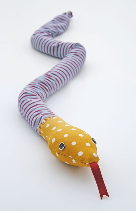 Stitched door snake 2 (Kirsty Neale) Door Snake, Cloth Animals, Handmade Stuffed Toys, Diy Dog Toys, Baby Toys Diy, Handmade Stuffed Animals, Childs Bedroom, Fabric Stamping, Electronics Projects Diy