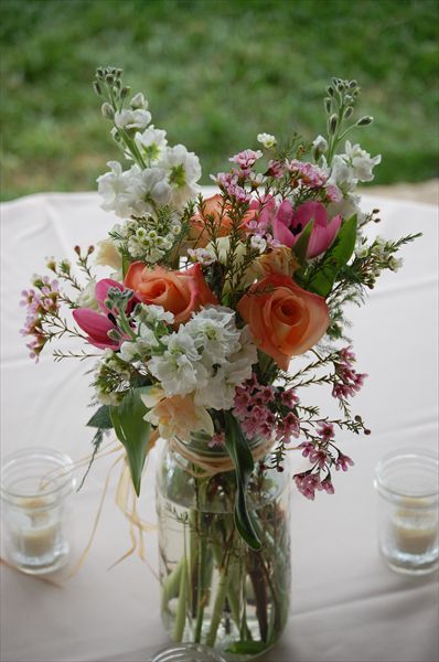 mason jar flower arrangement Mason Jar Floral Arrangements Wedding, Wedding Flowers Mason Jars, Mason Jar Centerpieces Spring, Mason Jar Wedding Flowers, Flowers In Mason Jars Wedding, Wild Flowers In Mason Jars, Floral Centerpieces For Party Simple, Mason Jar Flower Arrangements Wedding, Flower Jars Decoration