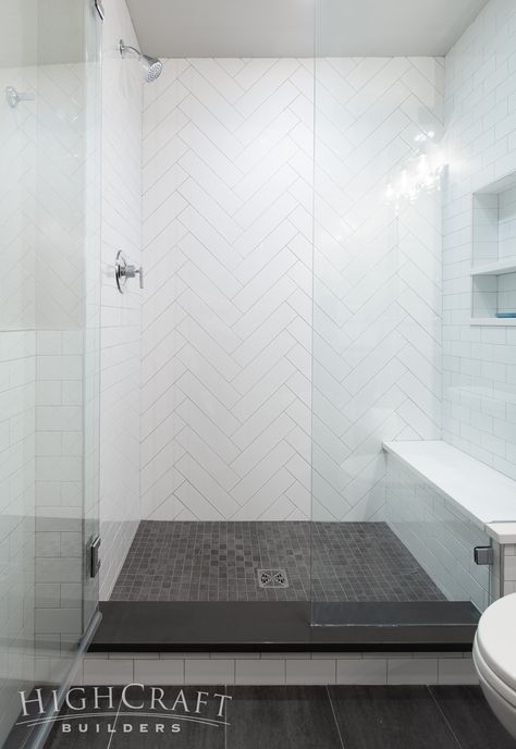 And 4×16 white subway tiles create a herringbone accent wall in the shower. Herringbone Accent Wall, Makeover Kamar Mandi, Subway Tile Showers, Subway Tiles Bathroom, Remodel Basement, White Subway Tiles, Wash Stand, Bad Inspiration, Master Bath Remodel