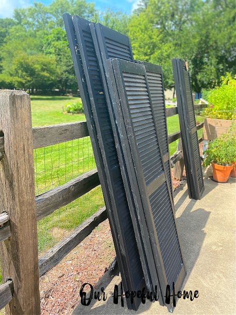 The vintage shutters were set in the driveway until I could decide which ones I was keeping and which ones I was selling.