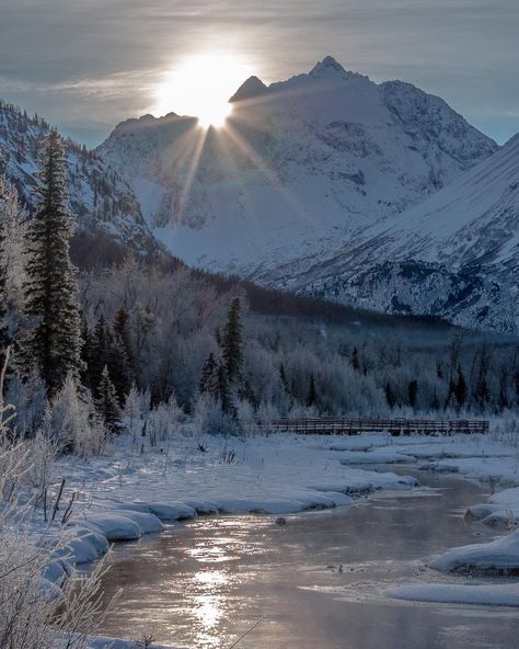 Sunrise Over The Chugach Mountains In Eagle River.  Photo By Brittney J Robles Photography  Love Alaska? Follow Us!> @ilovealaskafans  #ilovealaska #thealaskafrontier #alaska #eagleriver #chugachmountains #sunrise #riverlife #riverreflection #sunrays #snowyday #snowymorning #frostymorning #snowymountains #snowytrees #naturesbeauty #riverfishing #outdoorphotography Alaska Hunting, Eagle River Alaska, Snow Valley, Alaska Winter, Alaska Mountains, Watching The Sunrise, River Life, River Painting, Snowy Trees