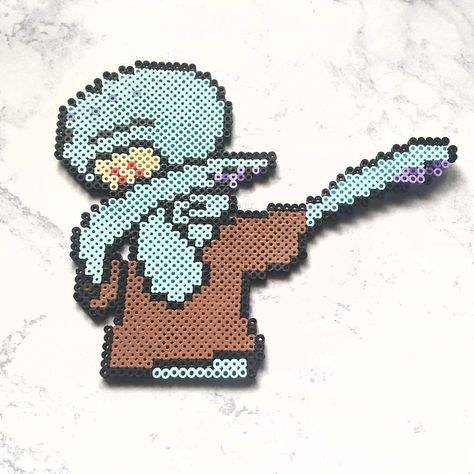 Dab squidward dab. #perlerbeads #perler #pixelart #pixelbeads #beads #pixel #squidward #squidwardmeme #squidwardtentacles… Patrick Perler Beads, Squidward Pixel Art, Squidward Perler Beads, Handsome Squidward Perler Beads, Spongebob Pixel Art, Mr Krabs Perler Beads, Meme Perler Beads, Bender Perler Beads, Kandi Perler