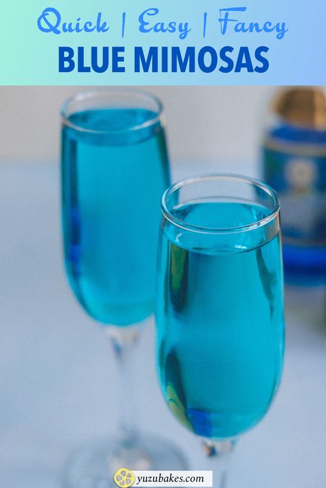 Blue Mimosa (Tiffany Mimosa) - Indulge in a blue mimosa also known as a Tiffany mimosa, with its gorgeous blue colour and fizzy sparkling taste. It's the perfect starter for every dinner party #cocktailrecipe #bluemimosa #tiffanymimosa #fancycocktail #drinkrecipe Tiffany Blue Mimosa, Tiffany Mimosa Recipe, Blueberry Mimosa Recipe, Blue Drinks For Baby Shower Recipes, Summer Mimosa Recipe, Blue Mimosa Recipe, Tiffany Mimosa, Salon Drinks, Blue Food Ideas