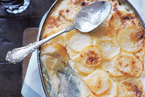 This preparation of au gratin potatoes eschews cheese in favor of spicy horseradish. Trust us, you won’t mix the extra dairy (or calories). And better yet? Set aside just 10 minutes to chop and prep, then let the oven do the rest of the work. You won’t believe how easy it is: First, butter a casserole dish, then combine the remaining five ingredients in a bowl before pressing it into the pan. Bake for 25 minutes with foil covering the dish, then another hour or so without the foil. Serve with a Passover Recipes Seder, Real Simple Recipes, Passover Feast, Potato Gratin Recipe, Christmas Recipes Easy, Potato Gratin, Passover Recipes, Jewish Recipes, Real Simple