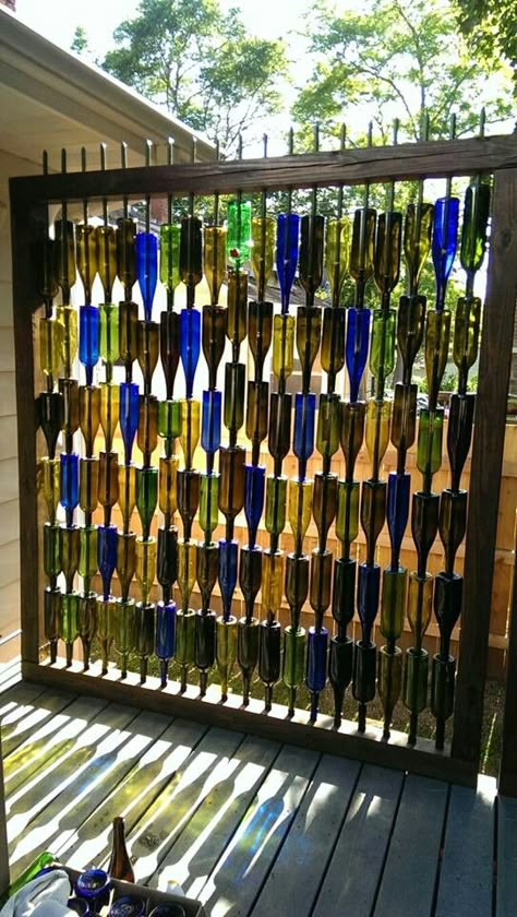 Wine bottle wall...framed with 4x4 lumber, using 7ft garden stakes for posts. Holes are drilled using an 11/16 inch drill bit with diamond dust tip (about $7 on ebay). Quite labor intensive, but worth the work! Wine Bottle Fence, Wine Bottle Wall, Bottle Trees, Storage Bathroom, Small Bathroom Ideas On A Budget, Small Bathroom Ideas Modern, Wine Bottle Art, Bottle Garden, Bottle Wall