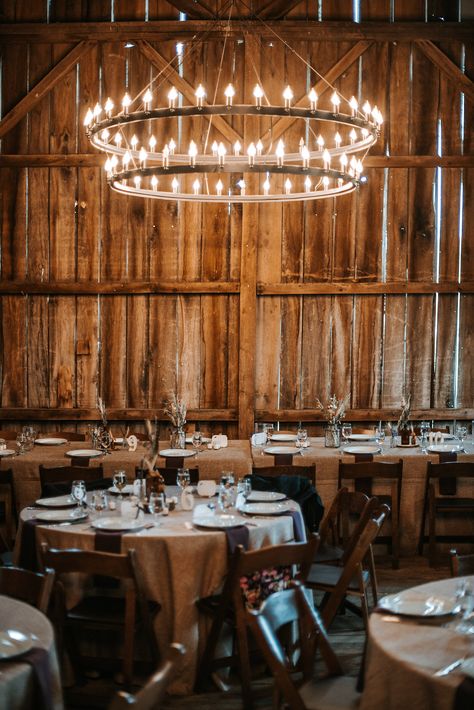 Love this #rustic barn chandelier in this Loudoun County #weddingvenue. http://www.bakerture.com Barn Chandelier Ideas, Large Rustic Chandelier High Ceilings, Farm Hanging Lights, Western Houses, Chandelier In Barn, Barn Chandelier, Chandelier In Barn Wedding, Barn Aesthetic, Vintage Chandelier That Compliments Barn Light Pendants