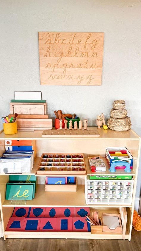 At Home Montessori Classroom, Montessori School Room, Montessori Inspired Classroom, Montessori Classroom Layout Preschool, Montessori Language Shelf, Homeschool Shelf, Montessori Art Shelf, Montessori Shelf Ideas, Montessori Homeschool Room