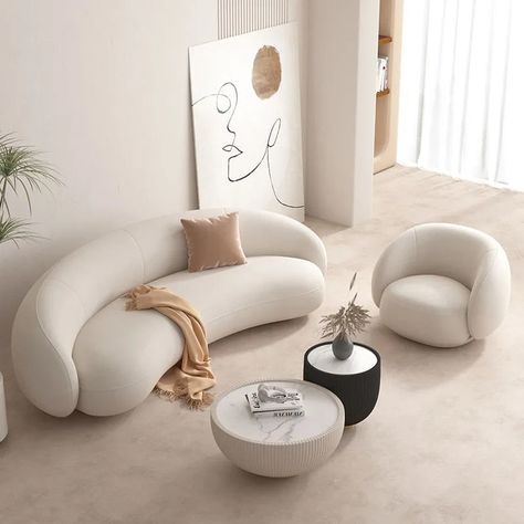 Comfort and Style All Within One Sofa! The Miles White Curved Sofa is the sofa design for your living room. It has a beautiful curved design that allows multiple people to gather and sit. Its pristine white colour adds a nice touch of elegance to any room, creating a striking focal point that invites you to unwind and relax. The upholstery offers a softness and warmth that hugs you in cosiness, making it the perfect place to relax after a long day. The sofa chair from Love Decors is not just abo Curved White Couch, Curve Sofa Design, Curve Sofa Living Room, White Velvet Couch, Elegant Sofa Design, Minimal Sofa Design, White Curved Sofa, Soft Interior Design, Modern Sitting Room