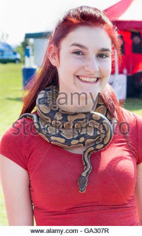 Young woman wearing a live snake like a necklace around her neck - Stock Photo Snake Around Neck, Neck Drawing, Beautiful Snakes, Snake Art, A Necklace, Digital Art Tutorial, Drawing Poses, Young Woman, Running Shoes For Men