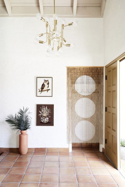 natural terracotta floor welcomes guests in this 70's airy scottsdale home. for natural terracotta options, check out our antique terracotta tiles at cletile.com #entryway #floor #tiles #terracotta Exit Room, Front Hall Closet, Urban Outfitters Curtains, Grey Backsplash, Bamboo Curtains, Terracotta Floor, Fireplace Hearth, Desert Homes, Terracotta Tiles