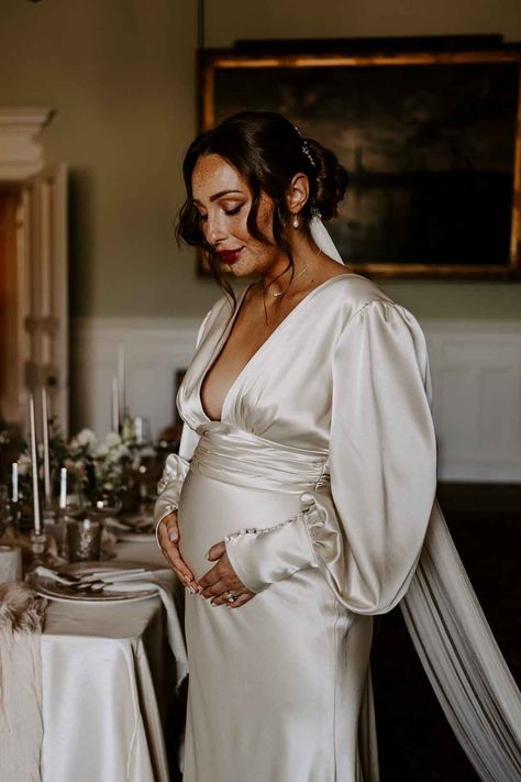 Satin maternity wedding dress for pregnant bride Dress For Pregnant Women Wedding, Winter Wedding Dress Pregnant, Wedding Dress While Pregnant, Courthouse Wedding Dress Maternity, Bride Pregnant Dress, White Long Sleeve Maternity Dress, Pregnant Civil Wedding Dress, Simple Maternity Wedding Dress, Courthouse Wedding Dress Pregnant