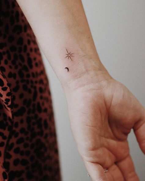 Minimalist north star and crescent moon tattoo on the Minimalist Star And Moon Tattoo, Small Tattoo Moon And Star, Dainty Moon And Stars Tattoo, Moon With Lines Tattoo, Mini Moon And Star Tattoo, Moon Star Matching Tattoos, Small Crescent Moon Tattoo Wrist, Star And Crescent Tattoo, Minimal North Star Tattoo