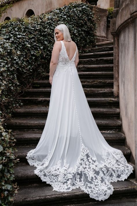 Lace covers a layer of luxurious silk chiffon to form the bodice of this dreamy A-line wedding gown | Wedding ideas, wedding dresses, wedding dresses 2023, timeless wedding dress, unique wedding gowns, wedding gown, luxury wedding dress, dream wedding dress, bridal style, elegant bridal gown, a-line wedding dress, lace weddingd ress, airy wedding dress, summer weddingd ress, spring weddingd ress, summer wedding, spring wedding, spring outfits, festival outfits, #bridetobe #weddingdress #wedding Plus Wedding Dress, Bridal Plus Size, Romance Wedding Dress, Allure Romance, Elegant Bridal Gown, Classy Wedding Dress, Allure Bridals, Curvy Bride, Wedding Dress Train