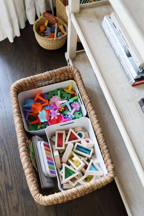 Our house has one living room that also functions as our family room. It was important to me that this room work for our whole family. That meant having a space that felt nice for adults, and one that had an area for my kids to play. Assuming that you don’t have a cabinet with closed doors, you’ll want to find storage that doesn’t look terrible. Minimal Playroom, Small Toy Storage, Creative Playroom, Toddler Toy Storage, Playroom Organization Ideas, Living Room Toy Storage, Toy Baskets, Kids Toy Organization, Toy Storage Baskets