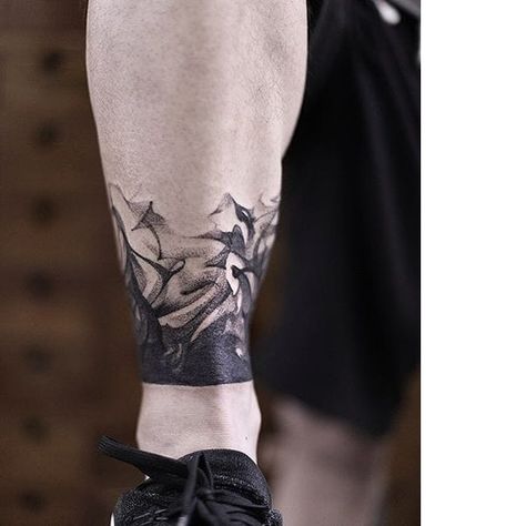 Ankle tattoo by Roman Melnikov #RomanMelnikov #blackwork #smoke #smoky #ankle | May 25th 2016 | 39685 Cool Ankle Tattoos, Survivor Tattoos, Ankle Band Tattoo, Ankle Tattoo Men, Leg Band Tattoos, Wrist Band Tattoo, Tattoo Samples, Lower Leg Tattoos, Ankle Tattoos