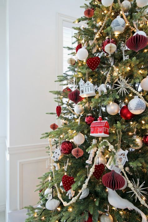 AM Dolce Vita 2019 Red Burgundy White Spruce Christmas Tree Crate Barrel Abaca Rattan Tree Collar7 Red And White Woodland Christmas Tree, Boho Red Christmas Tree, Subtle Red Christmas Decor, Traditinal Christmas Tree, Cranberry Christmas Tree Decorations, Minimal Red Christmas Tree, Christmas Tree Decorations Burgundy, Christmas Tree Red Velvet, Neutral Christmas Tree With Pop Of Red