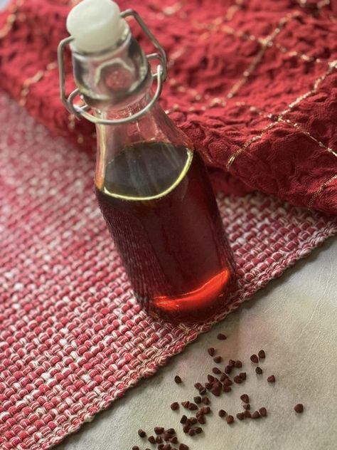 How to Make Annatto-Infused Oil | Aceite de Achiote Recipe Olive Oil Recipes, Rican Food, Infused Oil, Puerto Rican Recipes, Infused Oils, Puerto Rican, Olive Oil, Condiments, Seeds