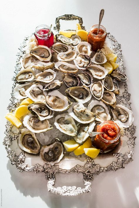 Silver Tray of Raw Oysters on Ice  by Jill Chen for Stocksy United Oyster Display Wedding, Oyster Charcuterie Board, Oyster Presentation Ideas, Oyster Serving Ideas, Oyster Display, Seafood On Ice, Oyster Tray, Oysters At Home, Oyster Dinner