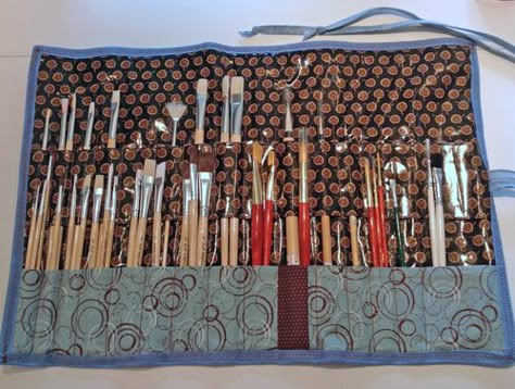 blue paintbrush roll-up - open_500px Rangement Art, Paintbrush Holder, Paint Brush Holder, Paint Brush Holders, Brush Holders, Yarn Storage, Laminated Fabric, Brush Roll, Easels