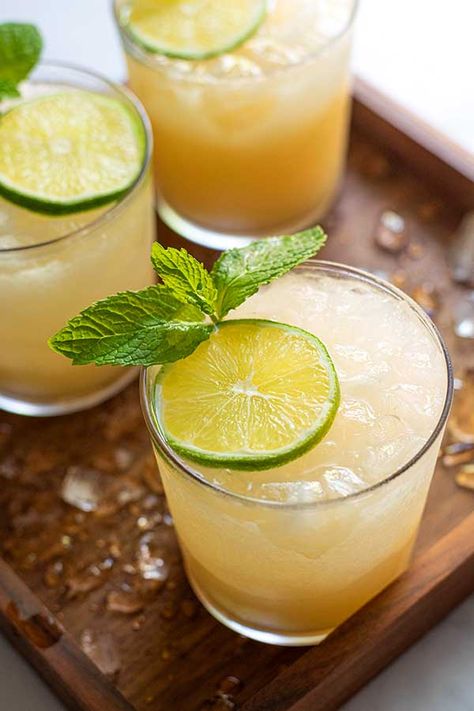 A classic Mai Tai is creamy, nutty, and crazy delicious! Made with two kinds of rum, lime juice, a sweet almond syrup, and orange liqueur, it's set to become your new go-to cocktail. #maitai #cocktail #tropicalcocktail #summerdrink #simplyrecipes Mai Thai Cocktail, Maitai Cocktail, Mai Tai Cocktail Recipes, Almond Syrup, Mai Tai Cocktail, Vodka Sour, Mai Thai, Orange Liqueur, Rum Cocktails