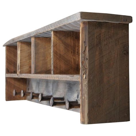 Rustic reclaimed pine wall shelf. Handmade in Aspen Colorado, circa 2nd half 20th century. Features four cubbies and railroad spikes as hooks for garments. Signed along the back.  46" x 8.5" x 15"h, cubbies 9" x 7" x 7" Reclaimed Wood Coat Rack, Old Wood Shelves, Primitive Shelves Wall Shelves, Railroad Spike Coat Rack, Inside Wood Storage Ideas, Old Barn Wood Ideas, Rustic Hall Tree, Rustic Entryway Ideas, Pallet Vanity