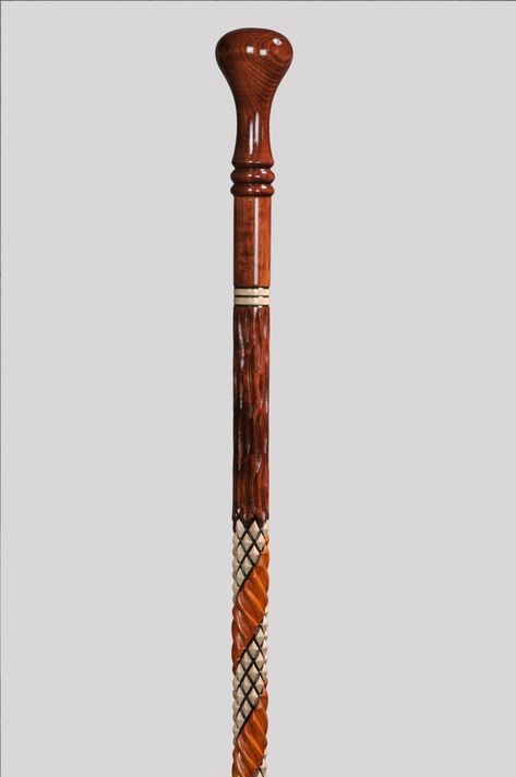 "lf you wish we can engrave your name or any text on the cane (Lenght: up to 40\"(100cm) * Supports up to 250 lbs. IMPORTANT INFORMATIONS A DEVREK Cane Is Made In 9 Stages 1. To Put It In The Oven 2. To Lathe 4. Making The Handle 3. Making The Shaft 5. Installing The Tip 6. Smoothing Plane and to sandpaper 7. Coloring 8. To Fret and To Embroidered 9. To Varnish Devrek Walking Sticks Devrek walking sticks are not just sticks but also works of art, with some individual sticks taking a month or mor Sticks Design, Power Carving Tools, Walking Staff, Stick Diy, Hand Carved Walking Sticks, Jewish Symbols, Canes And Walking Sticks, Cane Stick, Wooden Canes