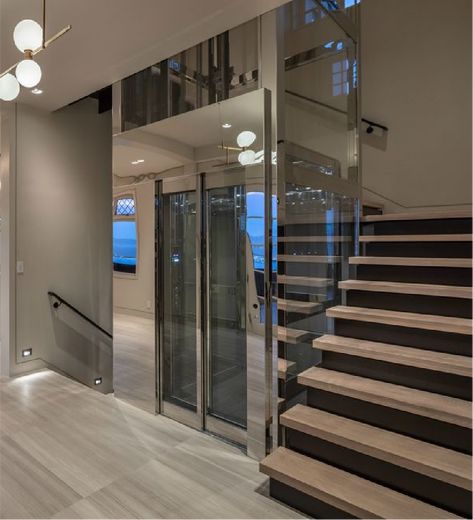 Glass Lift With Staircase, Modern House With Elevator, Penthouse Elevator Entrance, Lift In House Design, Home With Elevator, Elevator Designs For House, Stairs And Elevator Design, In Home Elevator, Glass Elevation House