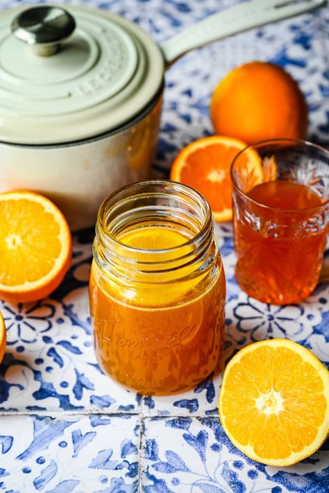 This homemade Orange Simple Syrup is perfect for adding a citrusy kick to cocktails, baked goods and so much more. You only need 3 ingredients and 5 minutes of hands on work to make a big batch that will last for weeks. Pound Cake Glaze, Orange Simple Syrup, Crowded Kitchen, Orange Cocktails, Simple Syrup Recipes, Freshly Squeezed Orange Juice, Raw Sugar, Syrup Recipe, Orange Recipes