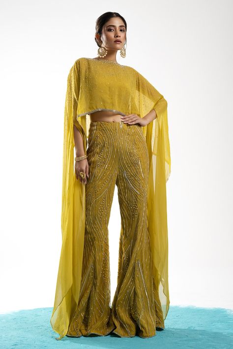 Shop for these amazing collections of Yellow Poncho: Organza Embroidery Cheeta Work Round Ernisa Pant Set For Women by Charu and Vasundhara online at Aza Fashions. Embroidered Poncho, Mehendi Outfit, Haldi Outfits, Trendy Outfits Indian, Diwali Outfits, Mehendi Outfits, Traditional Indian Dress, Cord Set, Indian Dresses Traditional