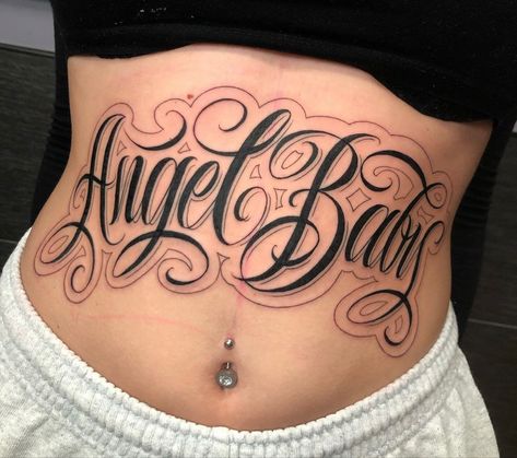 Back Of Thigh Script Tattoo, Script On Hand Tattoo, Stomach Script Tattoo Women, Stomach Tattoos Lettering, Chicano Stomach Tattoos, Small Zodiac Tattoos, Chicano Tattoos For Women, Tattoos Silly, Chola Tattoo Ideas