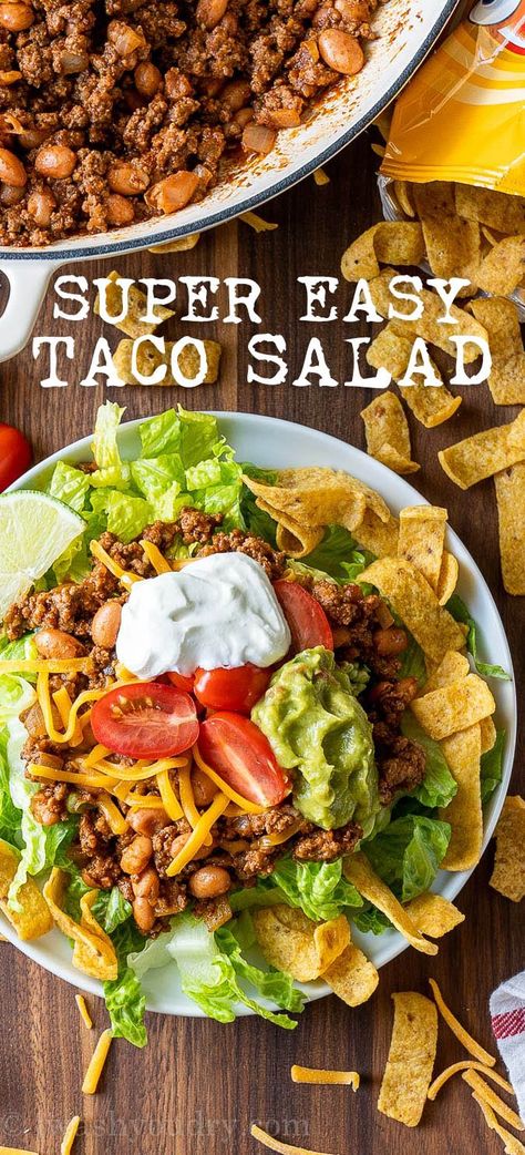 This quick and easy Taco Salad Recipe is made with ground beef and pinto beans on top of lettuce and corn chips! Pile on your favorite taco toppings for a quick and easy weeknight dinner! Nacho Salad, Easy Taco Salad Recipe, Taco Soup Recipe Easy, Taco Salad Recipe, Mexican Corn Salad, Taco Toppings, Endive Salad, Easy Taco Soup, Taco Salad Recipes