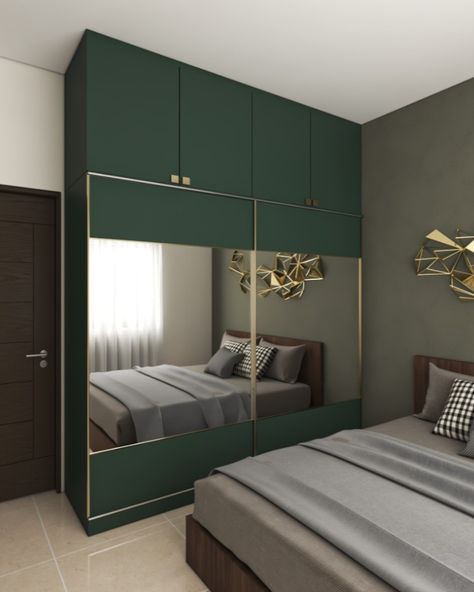 A swathe of dark green on the lower and upper cabinets gives a pleasant vibe to this all-white design.#kitchen #kitchendesign #interiordesign #homedecor #design #interior #kitchendecor #homedesign #homesweethome #renovation #bedroom #kitchenremodel #kitcheninspo #kitchenrenovation #interiordesignerbangalore #luxurykitchen #kitchenwardrobe #tallunit Dark Green Wardrobe Bedroom, Green Cupboards Bedroom, Green Wardrobe Bedroom, Cupboard For Bedroom, Green Wardrobe, Renovation Bedroom, Almirah Designs, Bedroom Cupboards, Green Interior Design