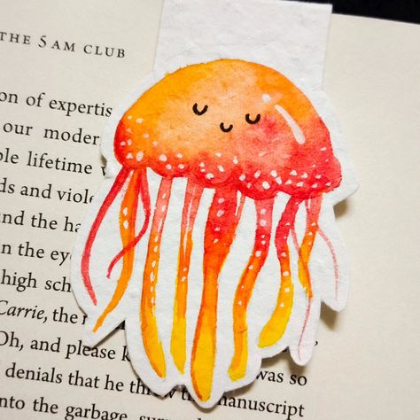 cute jellyfish bookmark °•🪸🪼⁠〰°• Dm to buy Paper: 300 gsm [ aesthetic, aesthetic bookmarks, jellyfish bookmark, cute bookmarks, aesthetic art, cute jellyfish bookmark, handmade bookmarks, hand-painted bookmarks, bookmark shop] #aesthetic #aesthetic bookmarks #jellyfish bookmark #cute bookmarks #aesthetic art #cute jellyfish bookmark #handmade bookmarks #hand-painted bookmarks #bookmarkshop #bookmarkshopindia Jellyfish Bookmark, Bookmarks Aesthetic, Aesthetic Bookmarks, Painted Bookmarks, Cute Jellyfish, Origami Bookmarks, Am Club, Nature Bookmarks, Bookmark Handmade