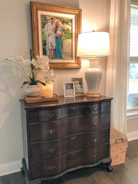 Tables With Lamps Decor, Chest In Living Room Decor, Traditional Nightstand Decor, Foyer Chest Decor Entryway, Traditional Bedroom Dresser Decor, Entryway Chest Decor, Top Of Chest Decor, Antique Table Styling, Grand Millennial Foyer