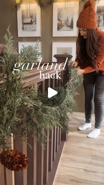 Ashley Hughes on Instagram: "The easiest way to hang garland- command hooks + binder clips👌🏻 your garland won’t be going anywhere! (Sometimes the binder clips aren’t necessary but if you find your garland sliding around at all, these will be a game changer for you!)

Garland + stockings linked in my Christmas highlight bubble + LTK link in my bio!😘
.
.
.
.
.
.
.
#garlandhack #christmasgarland #christmasdecor #stockings #hearthandhandwithmagnolia #hearthandhand #cottagesandbungalows #cottagesandbungalowsmagazine #christmascottage #cottagecore #englishcottage #englishcottagestyle" Hanging With The Hughes, Garland Over Picture On Wall, Hanging Christmas Stockings On Mantel, How To Hang Garland On Tree, Christmas Stocking On Stairs, Christmas Garland Banister, Garland Banister Christmas, Garland On Stairs Banisters, Garland With Hanging Ornaments