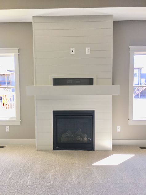 Shiplap fireplace! Chimney Designs Fire Places, White Fireplace With Wood Mantle And Tv, Shiplap Fireplace With Storage, Thick Mantle, Unfinished Basement Ceiling, House Fireplace, Old Home Remodel, Shiplap Fireplace, Farmhouse Fireplace