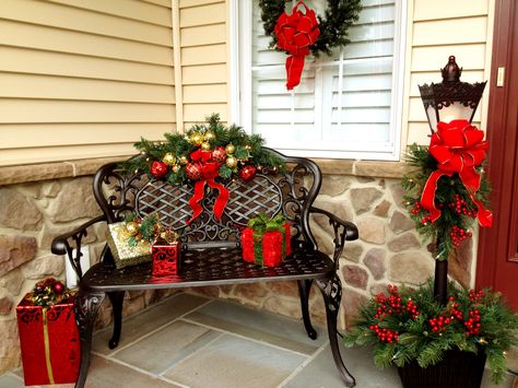 Outdoor Christmas Bench Decor, Christmas Front Porch With Bench, Outdoor Bench Decorating Ideas Christmas, Decorate Bench For Christmas, Outdoor Bench Christmas Decorating Ideas, Decorating Outdoor Bench For Christmas, Christmas Bench Decorations Outdoor, Christmas Porch Bench Decorating Ideas, Outdoor Bench Christmas Decor