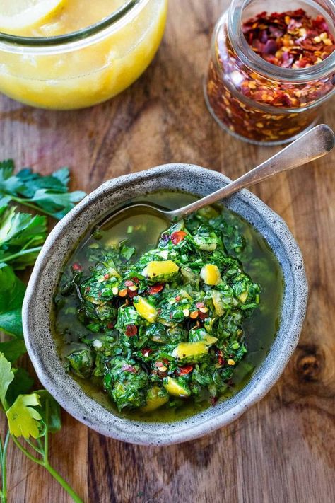 A delicious use for Preserved Lemons, this herby, zesty Preserved Lemon Gremolata w/ parsley, olive oil  & garlic is tasty over grilled fish, or meat or grilled veggies, or tossed with beans or pasta!  Fresh and flavorful! Lemon Gremolata Recipe, Preserved Lemon Recipes Using, Recipes With Preserved Lemons, Preserved Lemons Uses, Parsley Uses, Lemon Gremolata, Preserved Lemons Recipes, Gremolata Recipe, Feasting At Home