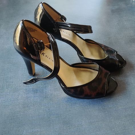 Anne Klein Open Toed Heels Brand New, Never Worn, Only Tried On In The House. Black Patent & Brown Textured Cheetah Open Heels With Strap Around Ankle With Buckle. Beige, Smooth Insoles As Well As Bottoms. Size 8. Brand Is Anne Klein. Looks Like They Are Comfortable To Wear All Day. Business Casual, Work Attire, Business Heels, Work Heels, Entrepreneur Style, City Chic, Leopard Print, Cheetah Print Heels, Dolce Style. All Sales Are Final. Send Me An Offer. Ready To Ship (No Box) Will Ship Well. Open Heels, Business Heels, Work Heels, Cheetah Print Heels, Casual Work Attire, Pretty Heels, Vintage Sandals, Cute Shoes Heels, Business Casual Work