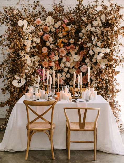 This stunning floral backdrop makes a dramatic statement when paired with an elegant table setting. Orange Wedding Colors, Flower Wall Wedding, Wooden Chairs, Fall Wedding Flowers, Floral Backdrop, Orange Wedding, Wedding Inspiration Fall, Green Wedding, Fall Flowers