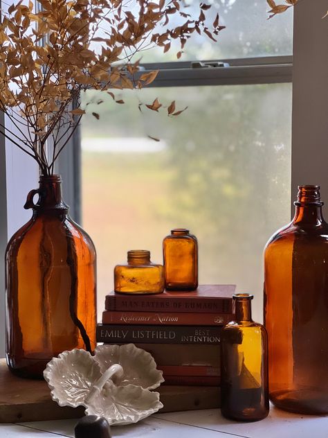 Amber Glass Decor Bathroom, Amber Bathroom Decor, Amber Bottles Decor, Cottagecore Fall Decor, Burnt Orange Fall Decor, Amber Decor, Orange Fall Decor, Window Sill Decor, Cottagecore Fall