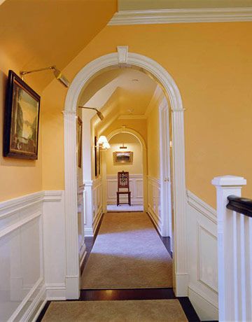 Convert regular doorways to arch doorways (especially in a hallway) using pre-fab arches. Yellow Hallway, Entryway Paint, Entryway Paint Colors, Hallway Paint Colors, Stairs Colours, Cream Paint Colors, Hallway Paint, Hallway Colours, Wooden Window Frames