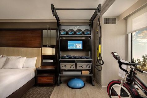 Private Gyms In Your Hotel Room Help You Stay Fit While You Travel Hotel Room Workout, Meditation Chair, Man Magazine, Room Gym, Hotel Gym, Hilton Hotels, Gym Room, Fitness Design, Gym Design